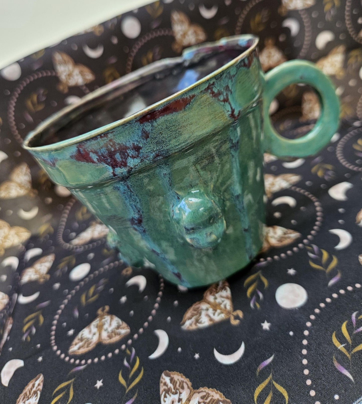 Handmade Green teacup lange skull