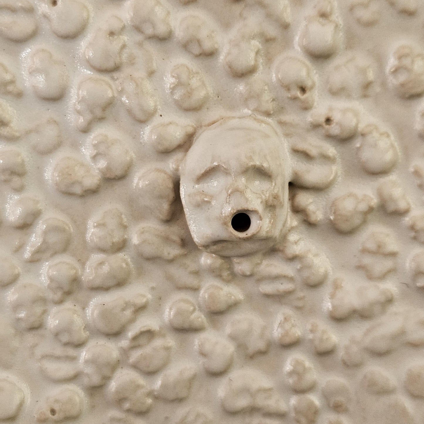 Skull Swarm Ceramic Incense Holder – Ritual Plate for Stick Incense, Ø12 cm by Red Raven Pottery