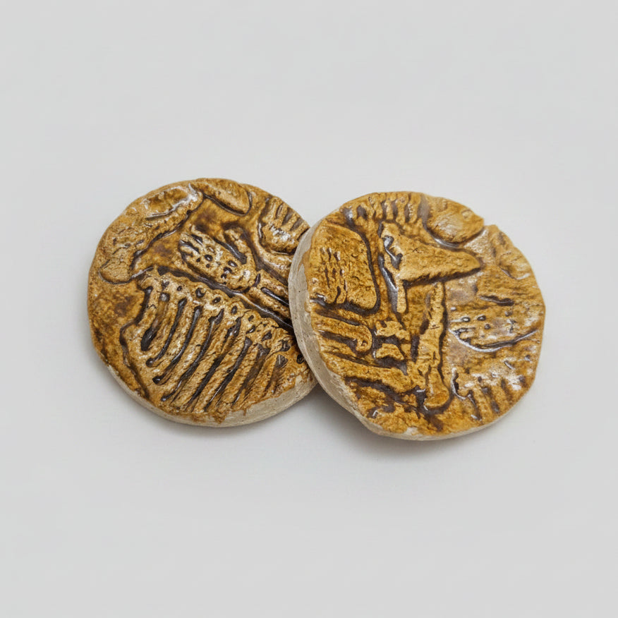 Bone Crypt Ceramic Fidgets – Grounding Tokens for ADHD, PTSD & Spectrum Relief, Ø2×0.5 cm by Red Raven Pottery