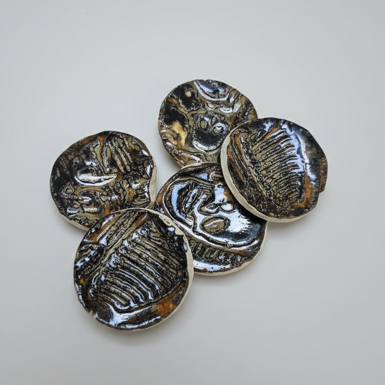 Bone Crypt Ceramic Fidgets – Grounding Tokens for ADHD, PTSD & Spectrum Relief, Ø2×0.5 cm by Red Raven Pottery
