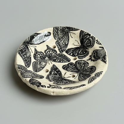 Cabinet of Creepers Handmade Ceramic Soap Dish – Insect & Moth Curiosity, Ø10 × 2 cm by Red Raven Pottery