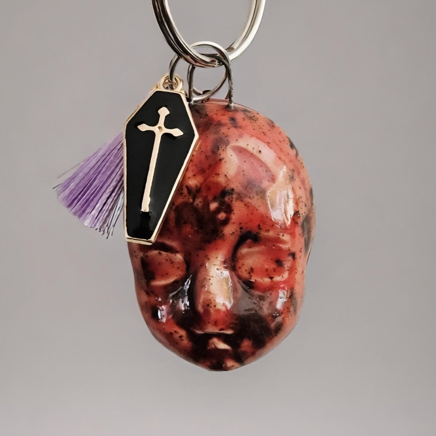 Doll Face Keychains – Eerie Ceramic Charms, 4×3 cm, various designs by Red Raven Pottery