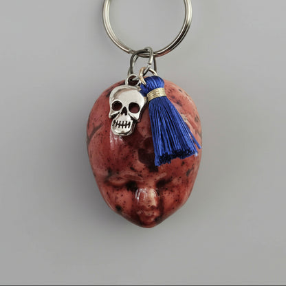 Doll Face Keychains – Eerie Ceramic Charms, 4×3 cm, various designs by Red Raven Pottery
