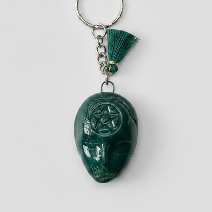 Doll Face Keyring – Enigmatic Ceramic Charm, 4 × 3 cm by Red Raven Pottery