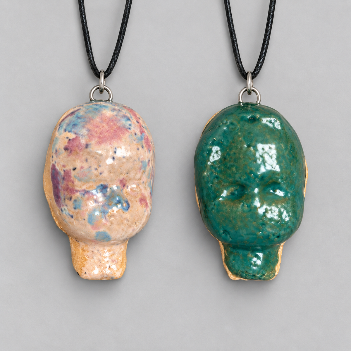 Doll Head Handmade Ceramic Necklace – Eerie Faceless Pendant, 5.5 × 3.5 × 2 cm by Red Raven Pottery
