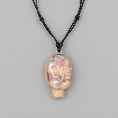 Doll Head Handmade Ceramic Necklace – Eerie Faceless Pendant, 5.5 × 3.5 × 2 cm by Red Raven Pottery
