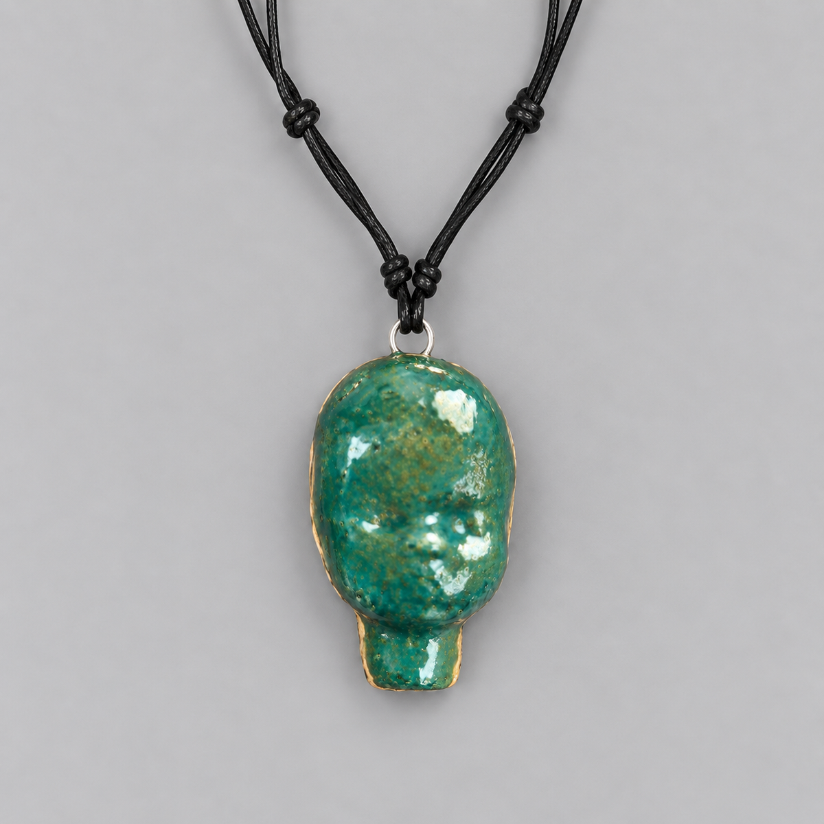 Doll Head Handmade Ceramic Necklace – Eerie Faceless Pendant, 5.5 × 3.5 × 2 cm by Red Raven Pottery