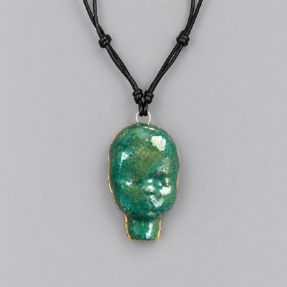 Doll Head Handmade Ceramic Necklace – Eerie Faceless Pendant, 5.5 × 3.5 × 2 cm by Red Raven Pottery
