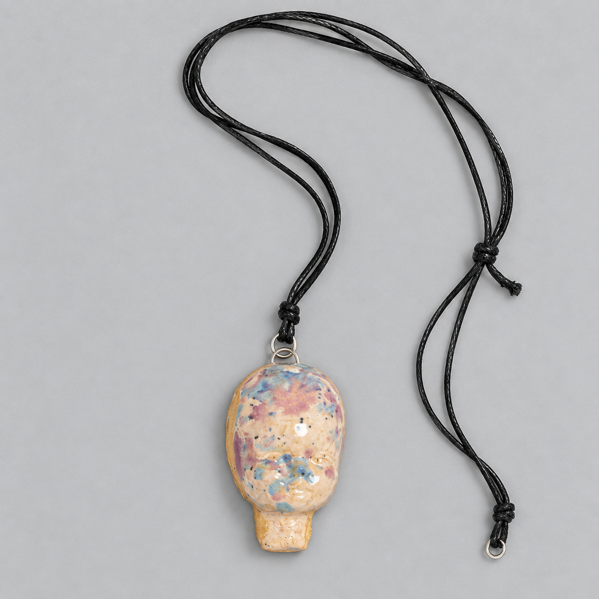 Doll Head Handmade Ceramic Necklace – Eerie Faceless Pendant, 5.5 × 3.5 × 2 cm by Red Raven Pottery