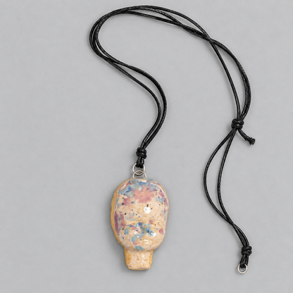 Doll Head Handmade Ceramic Necklace – Eerie Faceless Pendant, 5.5 × 3.5 × 2 cm by Red Raven Pottery