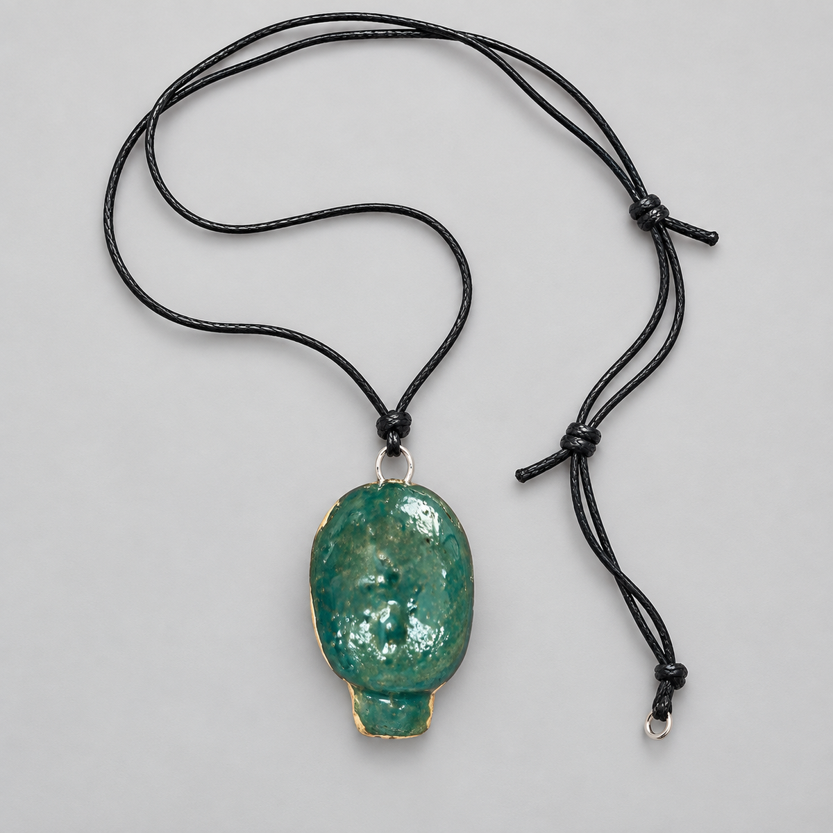 Doll Head Handmade Ceramic Necklace – Eerie Faceless Pendant, 5.5 × 3.5 × 2 cm by Red Raven Pottery