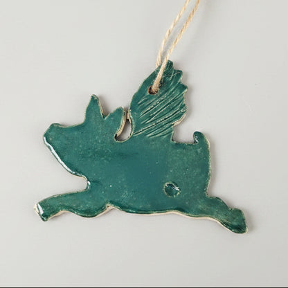 Flying Pig Ceramic Talisman – Turning Point Charm, 7.5×5.5 cm by Red Raven Pottery