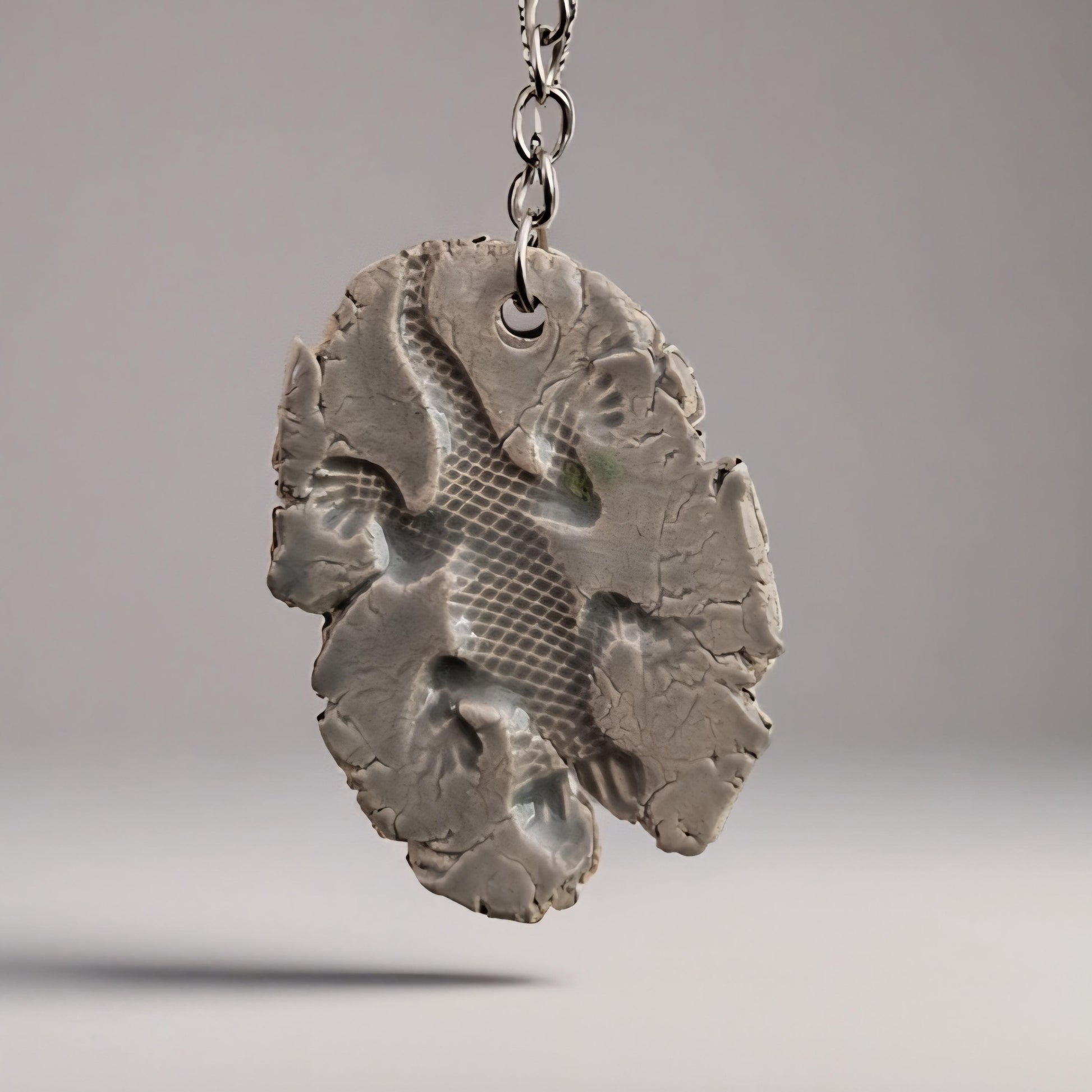 Fossil Imprint Keychain – Heirloom Ceramic Charm, 4×3 cm, various designs by Red Raven Pottery