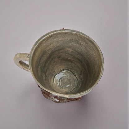 Frostbitten Gingerdead Ceramic Coffee Cup – Twisted Holiday Chaos, Ø9×8 cm by Red Raven Pottery