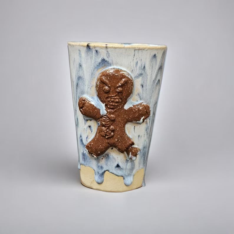 Frostbitten Gingerdead Ceramic Tumbler – Twisted Holiday Chaos, Ø8×12 cm by Red Raven Pottery