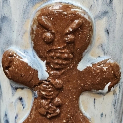 Frostbitten Gingerdead Ceramic Tumbler – Twisted Holiday Chaos, Ø8×12 cm by Red Raven Pottery