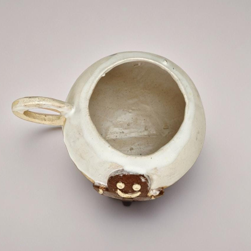 Frosty Gingerbread Ceramic Tea Mug – Jolly Season Warmth, Ø11×10 cm by Red Raven Pottery