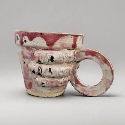 Gripping Hand Ceramic Coffee Cup – Bloodbound Art in Clay, Ø7×6.5 cm by Red Raven Pottery