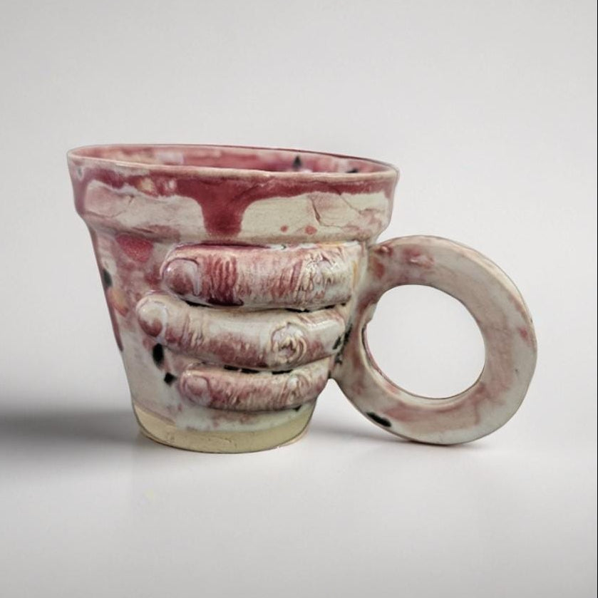 Gripping Hand Ceramic Coffee Cup – Bloodbound Art in Clay, Ø7×6.5 cm by Red Raven Pottery
