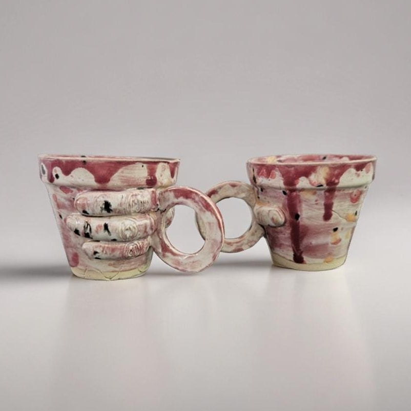 Gripping Hand Ceramic Coffee Cup – Bloodbound Art in Clay, Ø7×6.5 cm by Red Raven Pottery