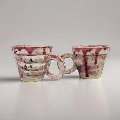 Gripping Hand Ceramic Coffee Cup – Bloodbound Art in Clay, Ø7×6.5 cm by Red Raven Pottery
