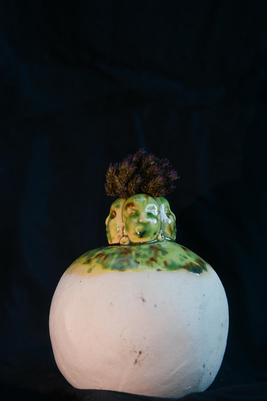 4 sided head vase