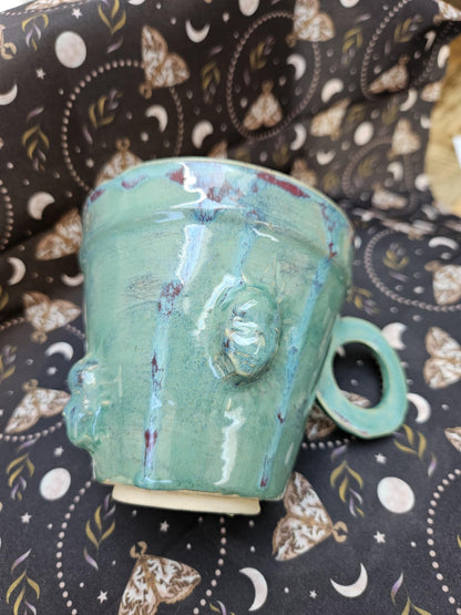 Handmade Green teacup lange skull