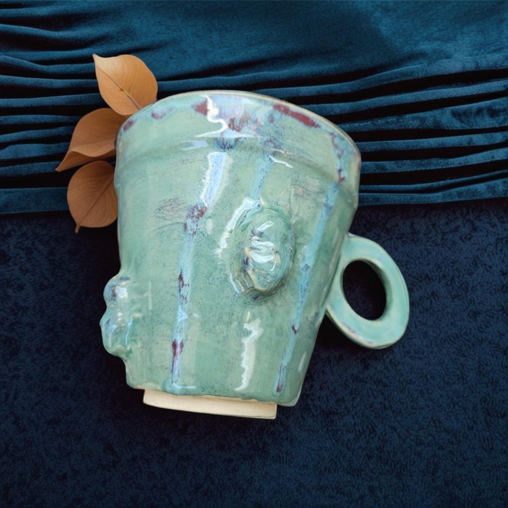 Handmade Green teacup lange skull