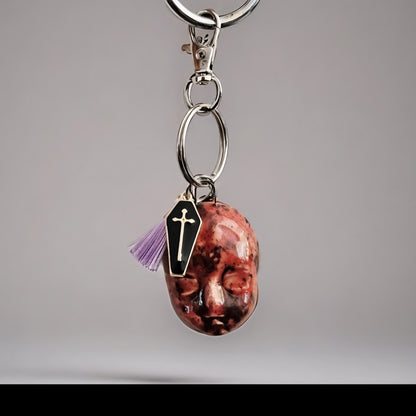 Gothic Baby Skull Keychains – Eerie Staring Ceramic Charms, 4×3 cm, various designs