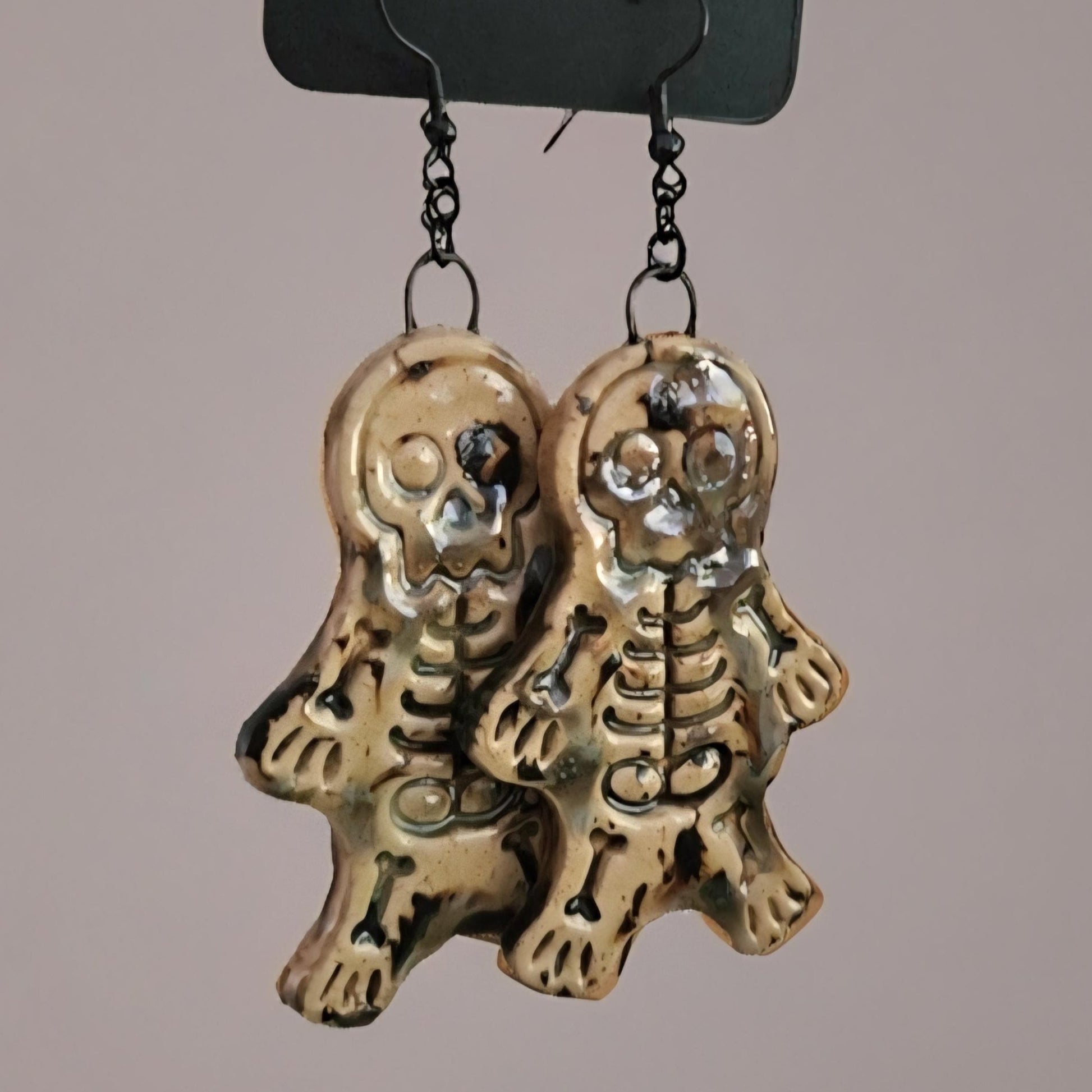 Spooky Scary Skeleton Earrings – Handmade Eerie Charms, 6×3 cm by Red Raven Pottery