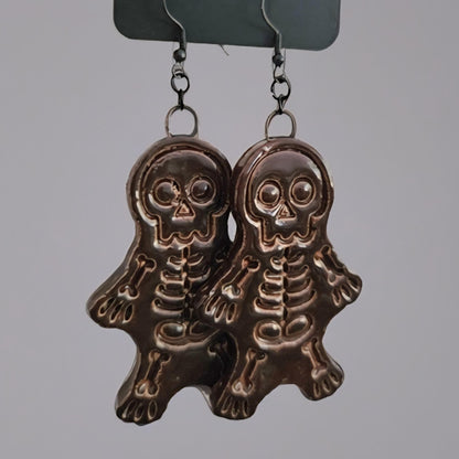 Spooky Scary Skeleton Earrings – Handmade Eerie Charms, 6×3 cm by Red Raven Pottery