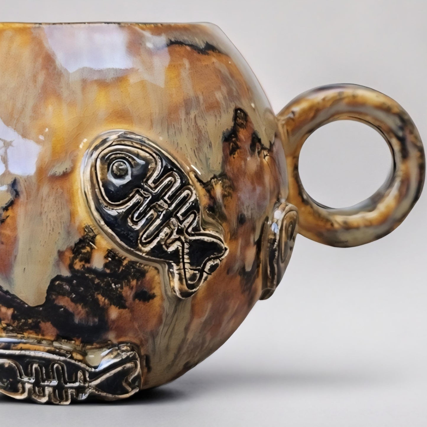 Earthfire Ceramic Teacup – Amber Glazed Fishbone Cup, Ø9.5×11 cm by Red Raven Pottery