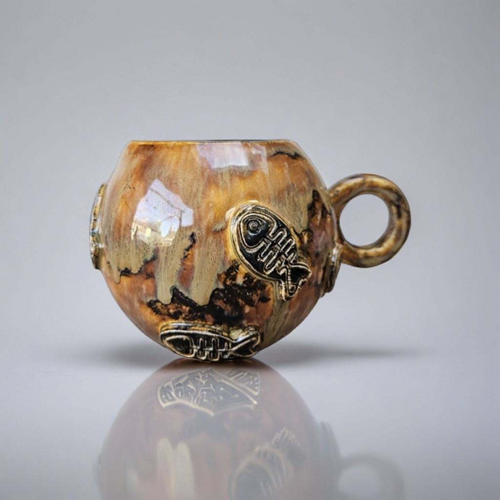 Earthfire Ceramic Teacup – Amber Glazed Fishbone Cup, Ø9.5×11 cm by Red Raven Pottery