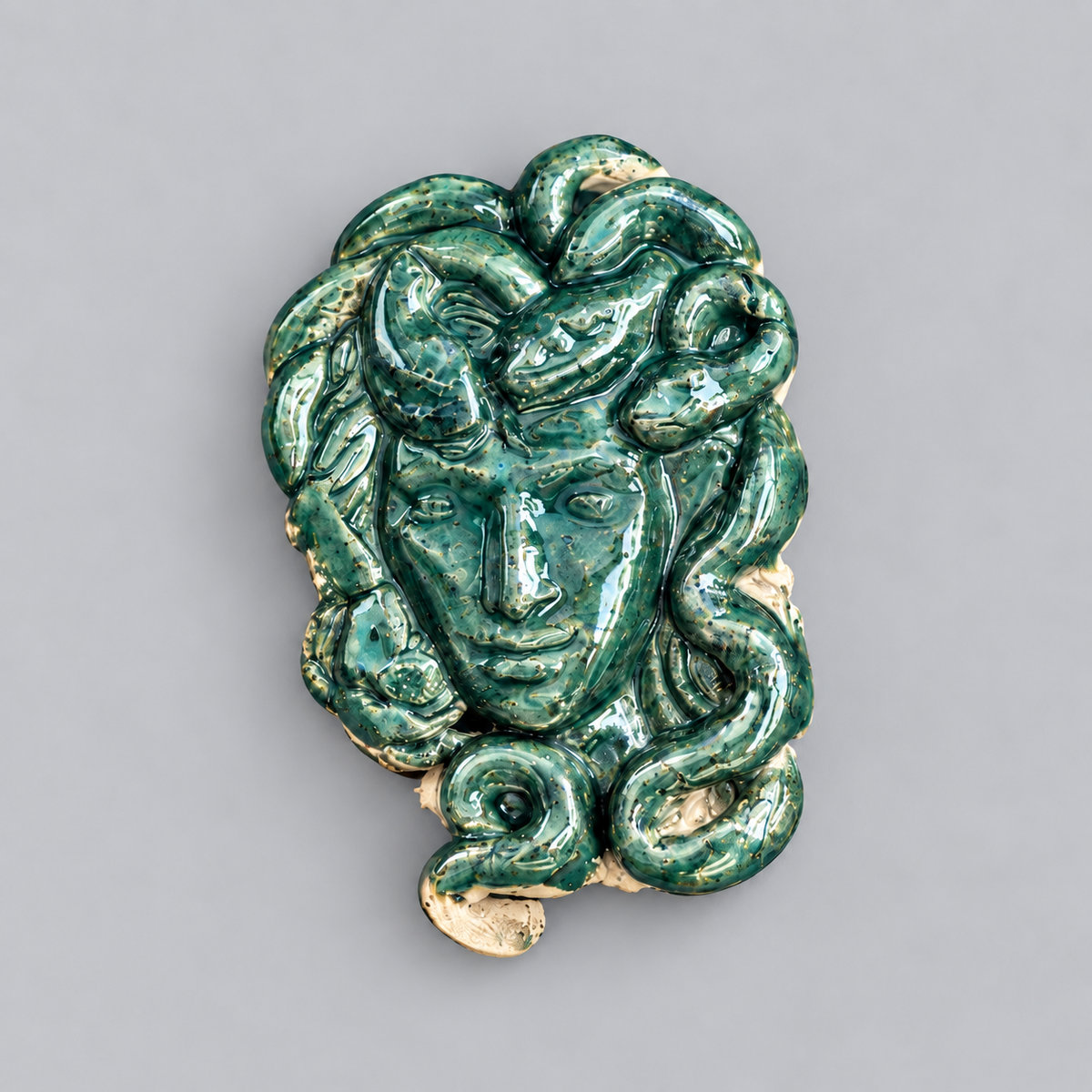 Medusa’s Gaze Handmade Ceramic Fridge Magnet – Mythological Ornament, 7 × 4.5 × 0.5 cm by Red Raven Pottery