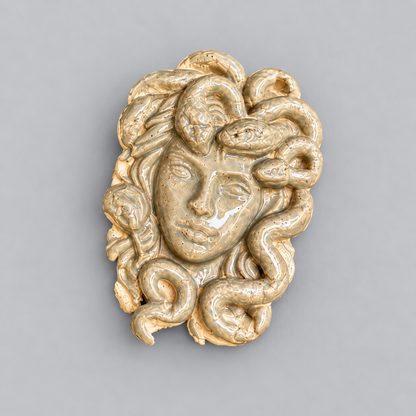 Medusa’s Gaze Handmade Ceramic Fridge Magnet – Mythological Ornament, 7 × 4.5 × 0.5 cm by Red Raven Pottery