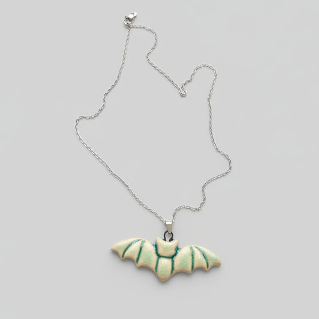 Moonwing Bat Necklace – Twilight Ceramic Pendant, 6 × 2.3 cm by Red Raven Pottery