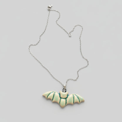 Moonwing Bat Necklace – Twilight Ceramic Pendant, 6 × 2.3 cm by Red Raven Pottery