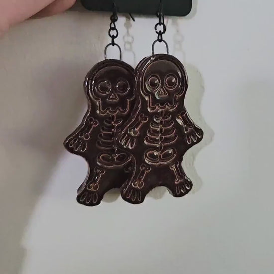 Spooky Scary Skeleton Earrings – Handmade Ceramic Eerie Charms, 6×3 cm by Red Raven Pottery