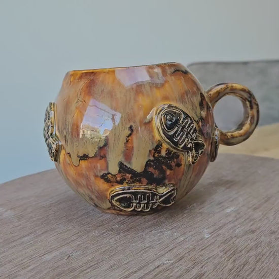 Earthfire Ceramic Teacup – Amber Glazed Fishbone Cup, Ø9.5×11 cm by Red Raven Pottery