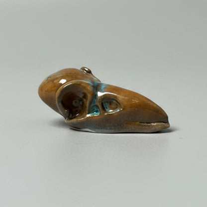 Raven Skull Pocket Talisman – Ceramic Relic of Dark Wisdom, 5×2×1.5 cm by Red Raven Pottery