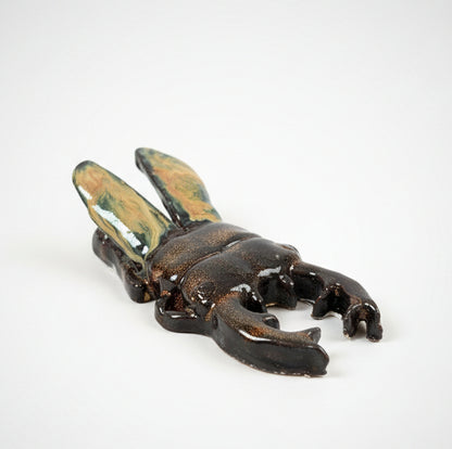 Scarab Beetle Ceramic Paperweight – Sunward Raised Wings, 14×7.5×3.5 cm by Red Raven Pottery