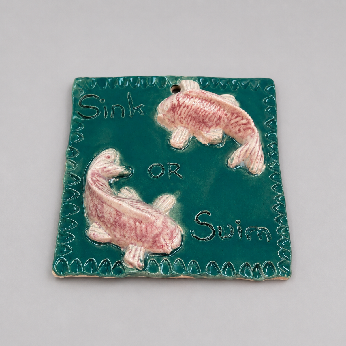 Sink or Swim Ceramic Tile – A Reminder to Keep Going, 9 × 9 × 1.5 cm by Red Raven Pottery