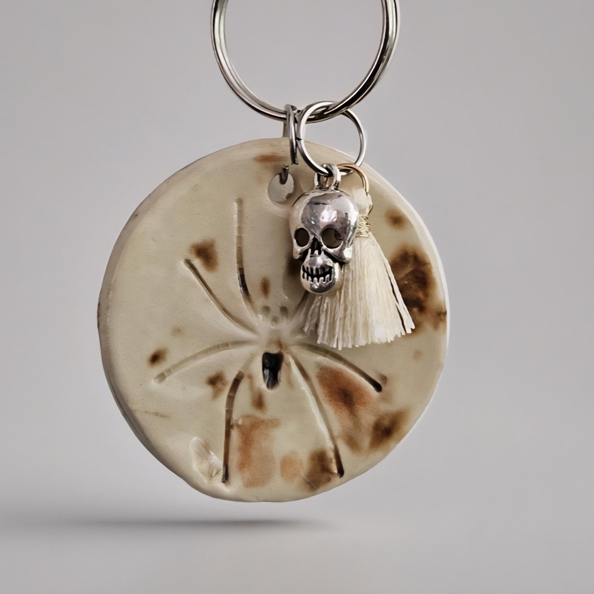 Spider Imprint Keychain – Manifesting Ceramic Charm, 4×3 cm, various designs by Red Raven Pottery