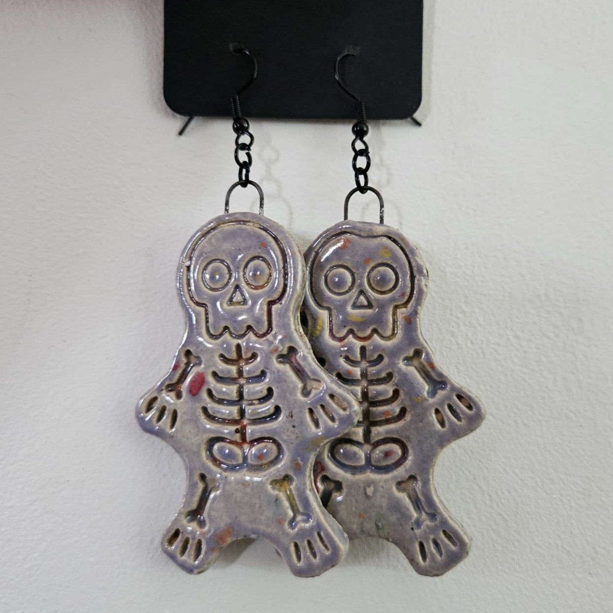 Spooky Scary Skeleton Earrings – Eerie Ceramic Charms, 6×3 cm by Red Raven Pottery