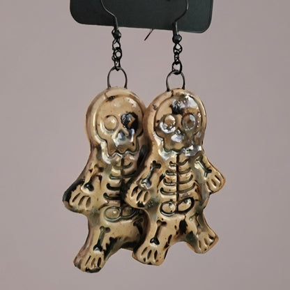 Spooky Scary Skeleton Earrings – Eerie Ceramic Charms, 6×3 cm by Red Raven Pottery