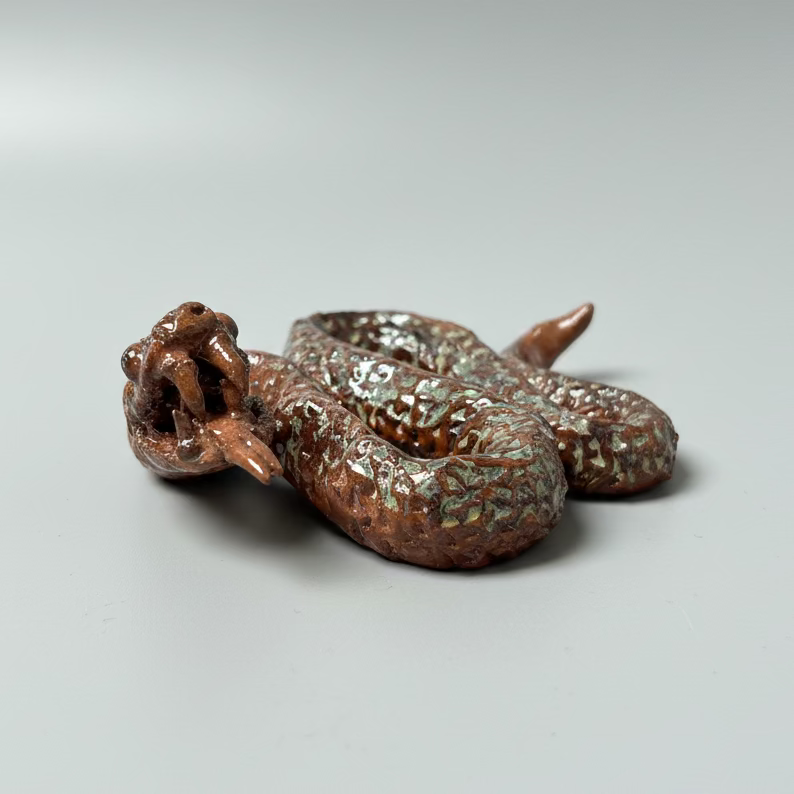 Venomous Serpent Ceramic Figurine – Quiet Guardian of Renewal, 13×10×4.5 cm by Red Raven Pottery