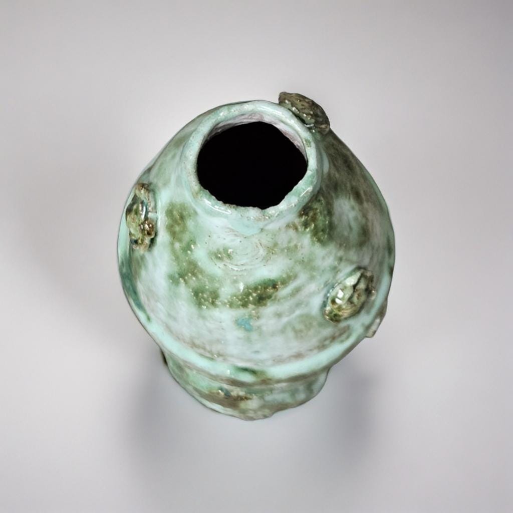 Verdant Perch Ceramic Vase – Embossed Bird in Rustic Green, Ø9×20.5 cm by Red Raven Pottery